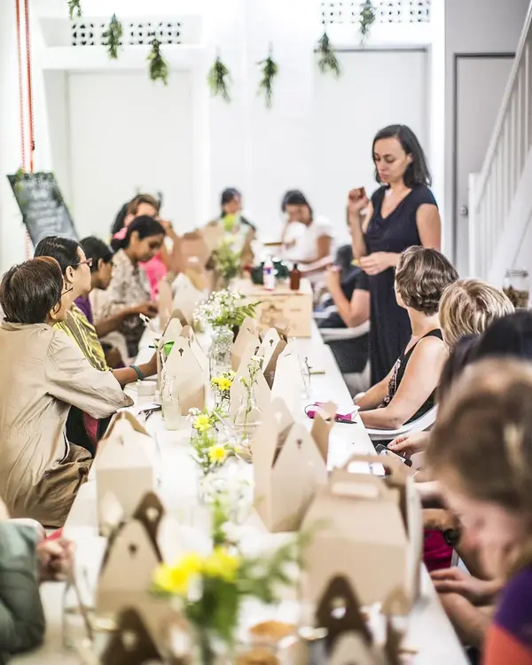 Militza Maury teaching a coconut oil workshop