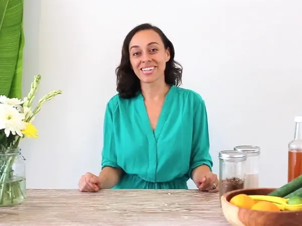 Militza Maury preparing natural skincare ingredients